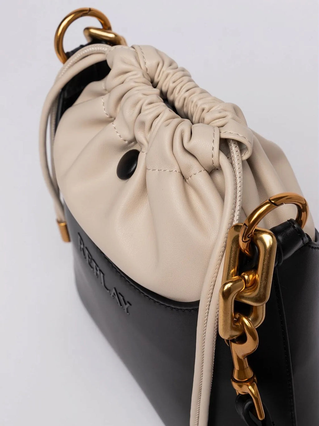 BLACK AND NUDE BUCKET BAG WITH LACES